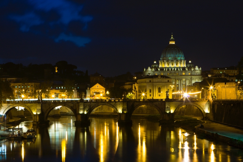 Vatican_City_by_night_close-up_Rome_Italy.jpg - Vatican City, officially State of the Vatican City (Italian: Stato della Città del Vaticano), is a landlocked sovereign city-state whose territory consists of a walled enclave within the city of Rome. At approximately 44 hectares (110 acres), and with a population of around 800, it is the smallest independent state in the world by both population and area.